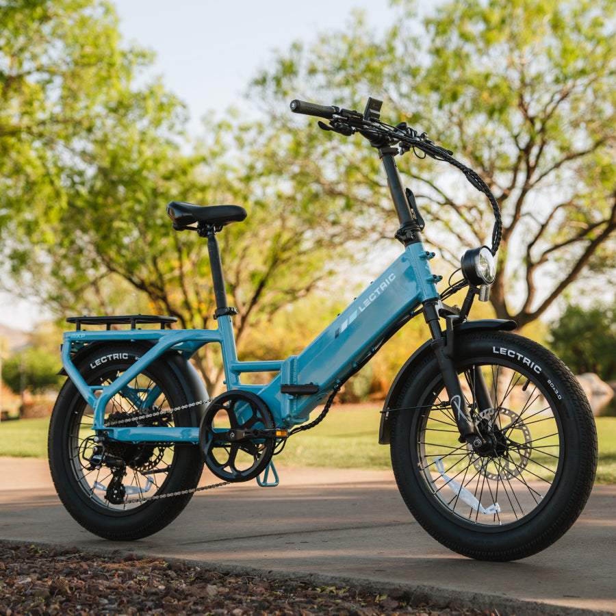 XP4 750 Step-Thru Raindrop Blue + FREE LevelUp Rack, Bike Lock, Phone Mount, Elite Headlight, Suspension Seat Post ($505 Value) [CA]